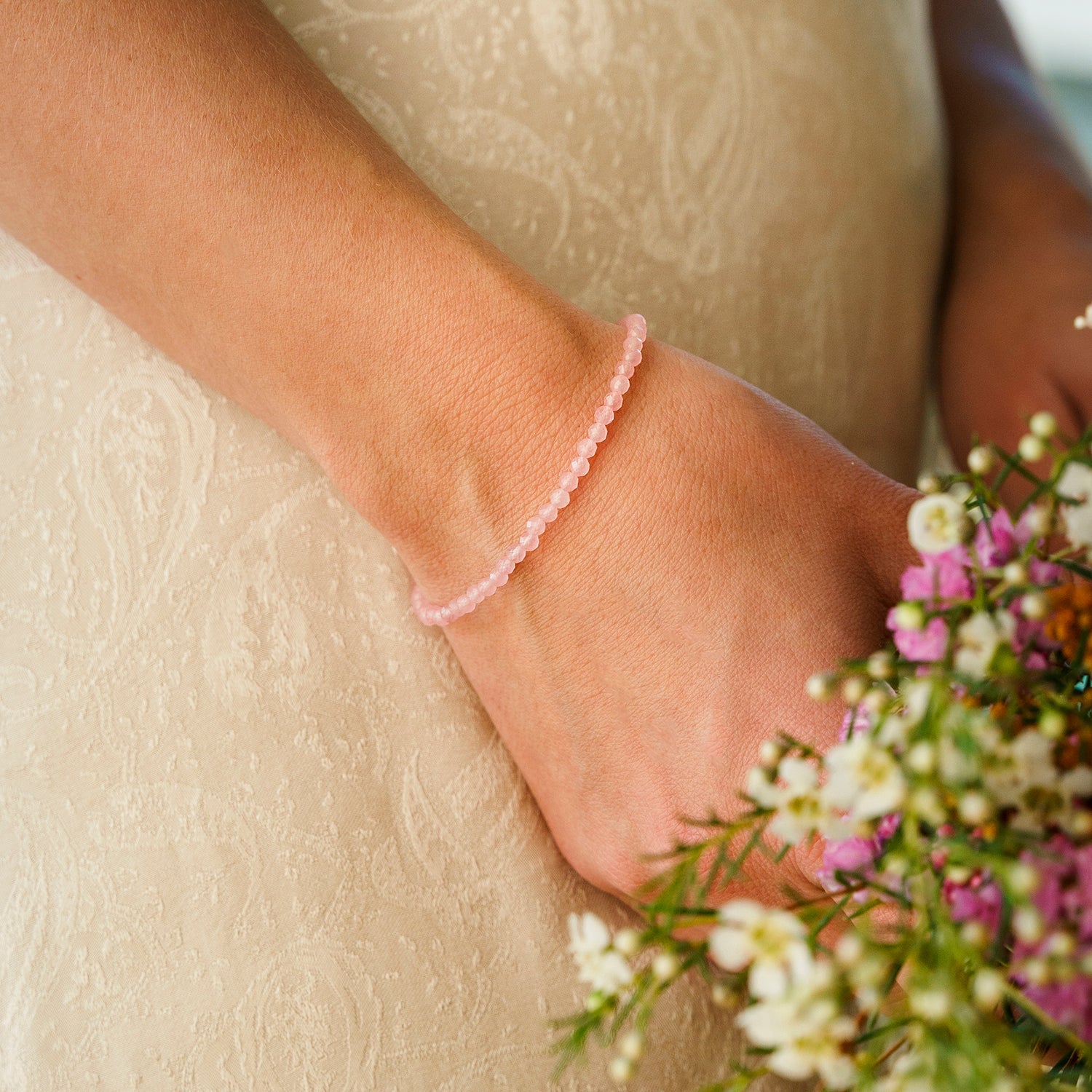 Love-armband met geslepen rozenkwarts